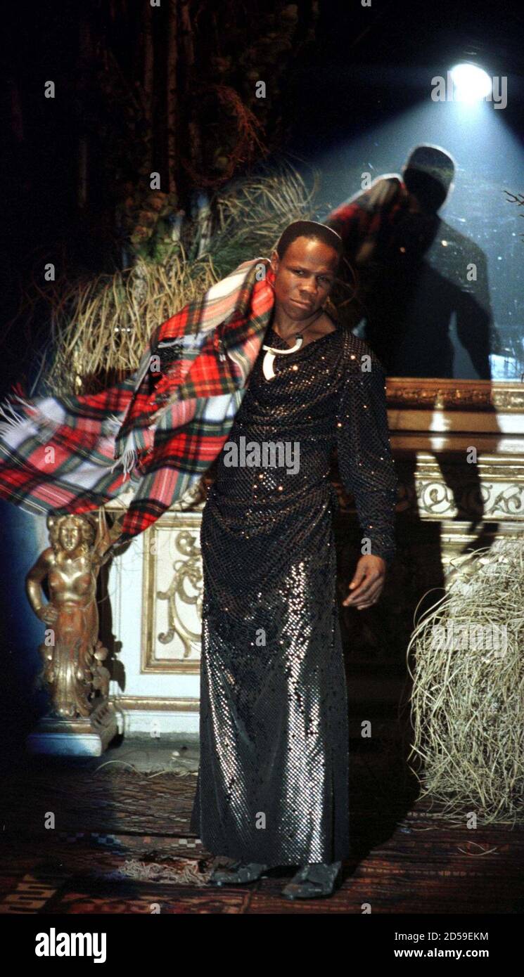 British Ex Boxer Chris Eubank The Star In The Show Wears A Fantasy Satin Dress As Part Of Vivienne Westwood Collection During The Autunn Winter 99 00 Men Fashion Show January 8 The Milan S Men