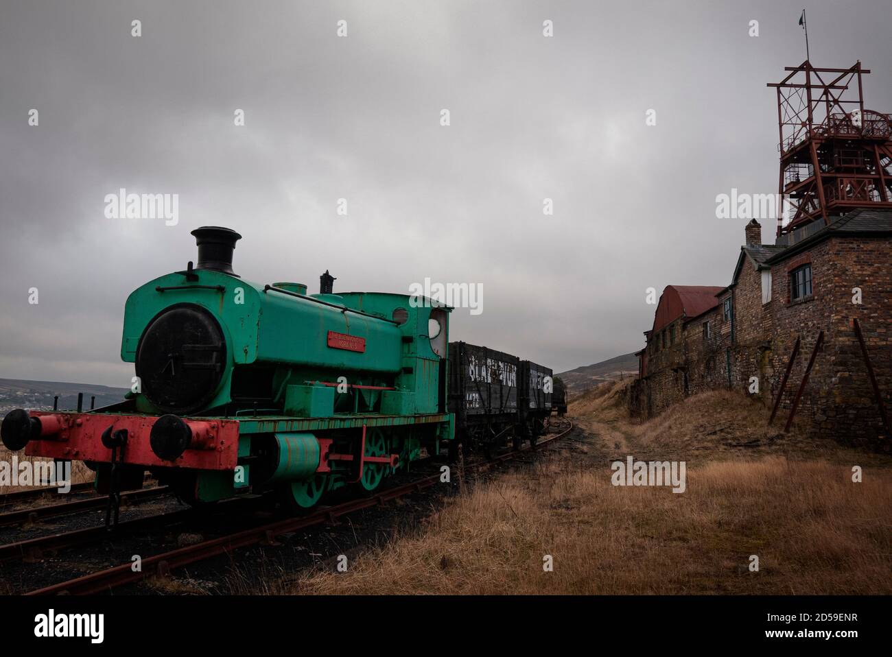 Railway engine and trucks at Big Pit, former coal mine at the UNESCO World Heritage Site, Blaenavon Industrial Landscape, South Wales, United Kingdom Stock Photo