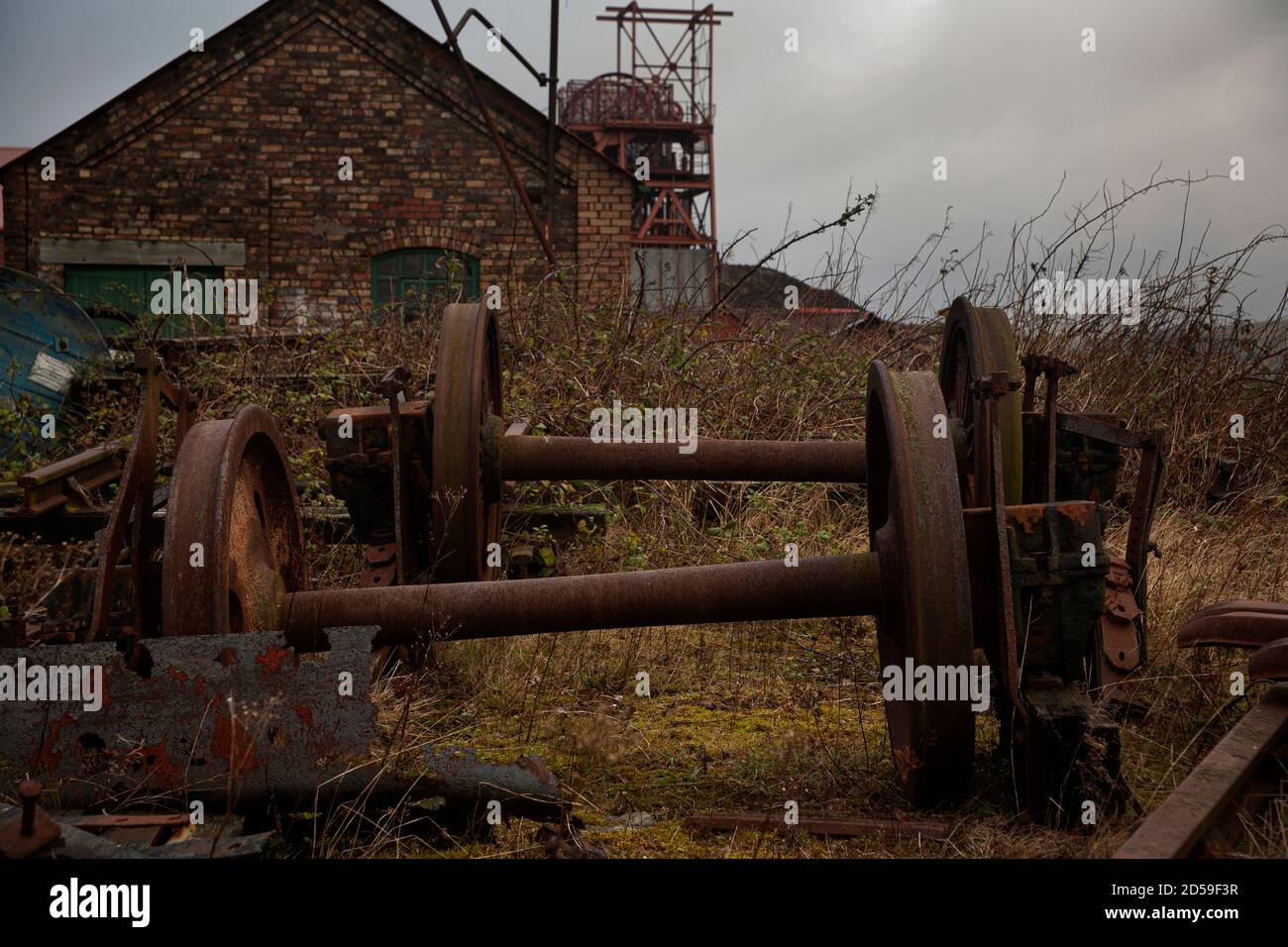 Iron machine parts discarded at Big Pit former coal mine at UNESCO World Heritage Site, Blaenavon Industrial Landscape, South Wales, United Kingdom Stock Photo
