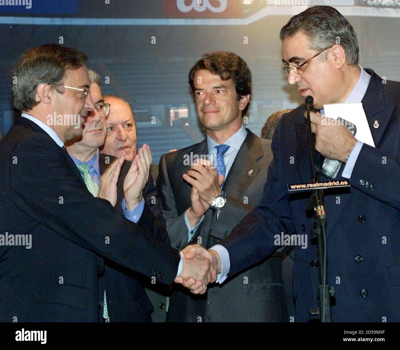 Real Madrid S New President Florentino Perez L Is Congratulated By His Predecessor Lorenzo Sanz During His Swearing In Ceremony At Santiago Bernabeu Stadium July 17 Perezwould Not Be Rushed Into Any Decision Over