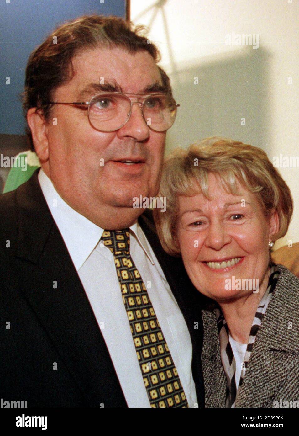 Leader of the Social Democratic and Labour Party John Hume celebrates winning the Nobel Peace Prize with his wife Pat October 16. [ Hume shared the prize with Northern Ireland's First Minster David Trimble, leader of the Ulster Unionist Party.  ]