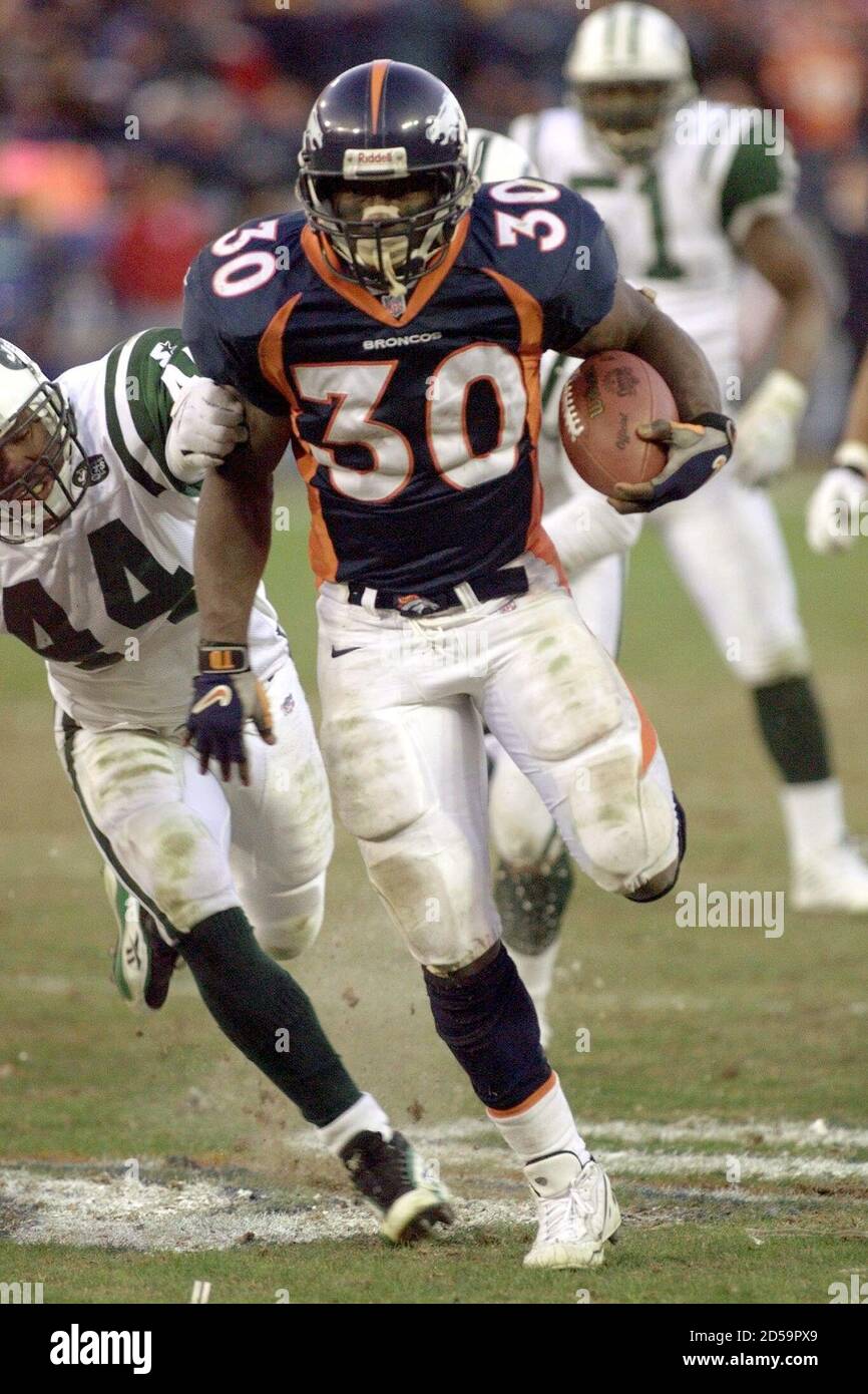 Denver Broncos running back Terrell Davis blows by New York Jets safety  Corwin Brown (44) to score Denver's second touchdown in the third quarter  of the AFC Championship game against the New