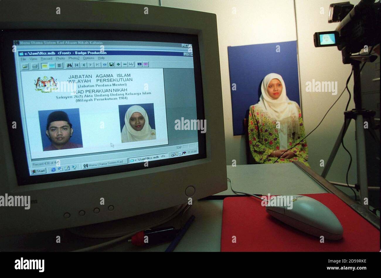 A soon-to-be-married Malaysian woman has her picture taken for the 
