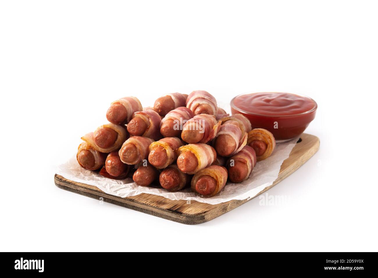 Pig in blankets. Sausages wrapped in smoked bacon isolated on white background Stock Photo Alamy