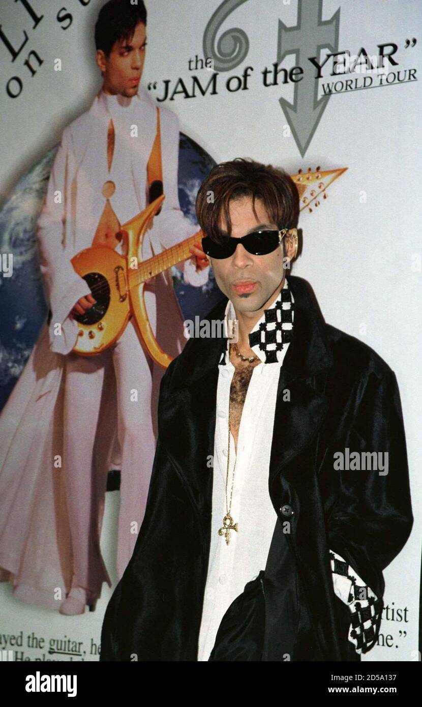 The Artist (formerly known as Prince) poses before a press conference in New York July 22 held to discuss his 'Jam of the Year' tour and album release. The Artist will play the Jones Beach Theatre on Long Island July 23. Stock Photo