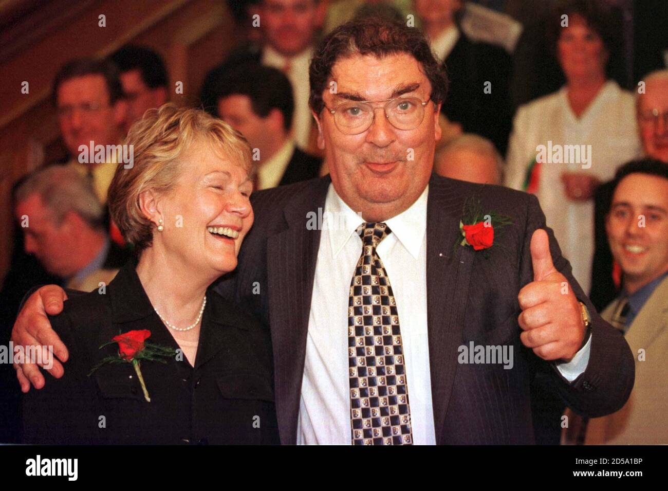 Social Democratic and Labour Party leader John Hume (R) celebrates his victory in the Foyle constituency of the new Northern Ireland Assembly with his wife Pat June 26. Counting for the 108 seat assembly takes place across Northen Ireland today but a full result may not be known until tommorrow.  DC/EB Stock Photo