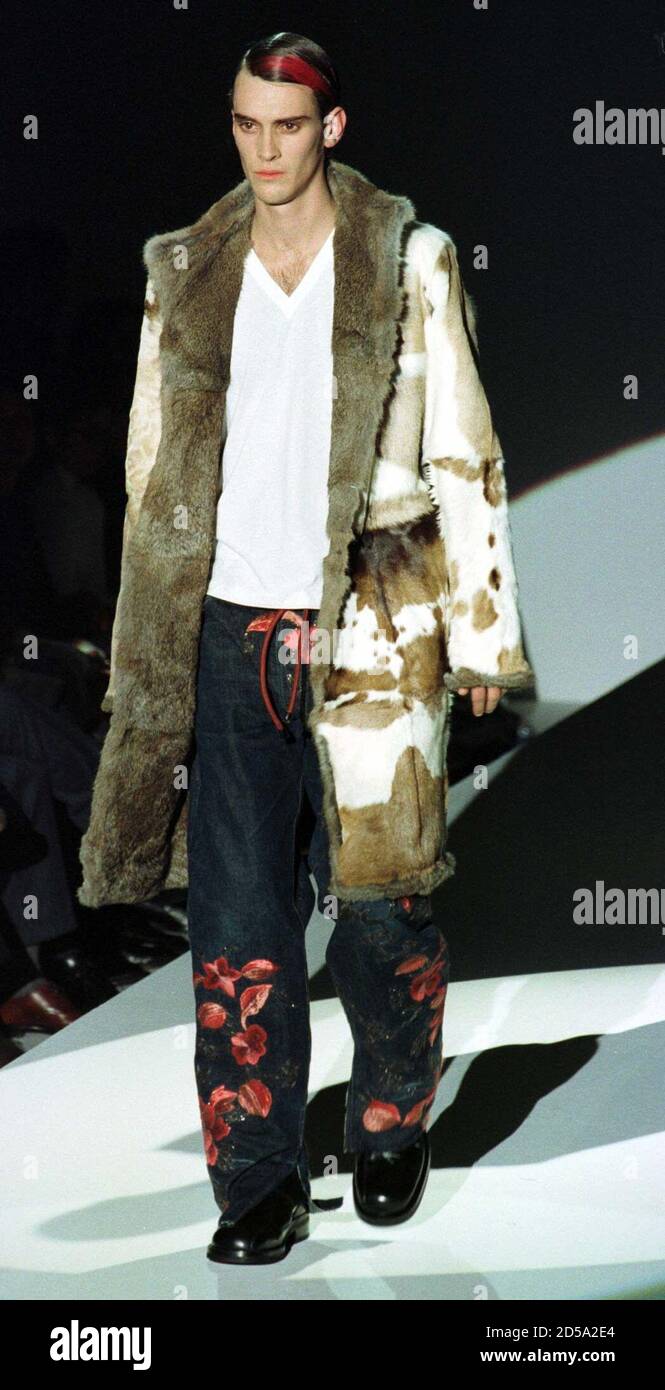 A model displays an outfit as part of the Gucci collection during the  autumn/winter 1999/2000 men fashion show January 10. Milan's fashion shows  will run until January 13 with the last show