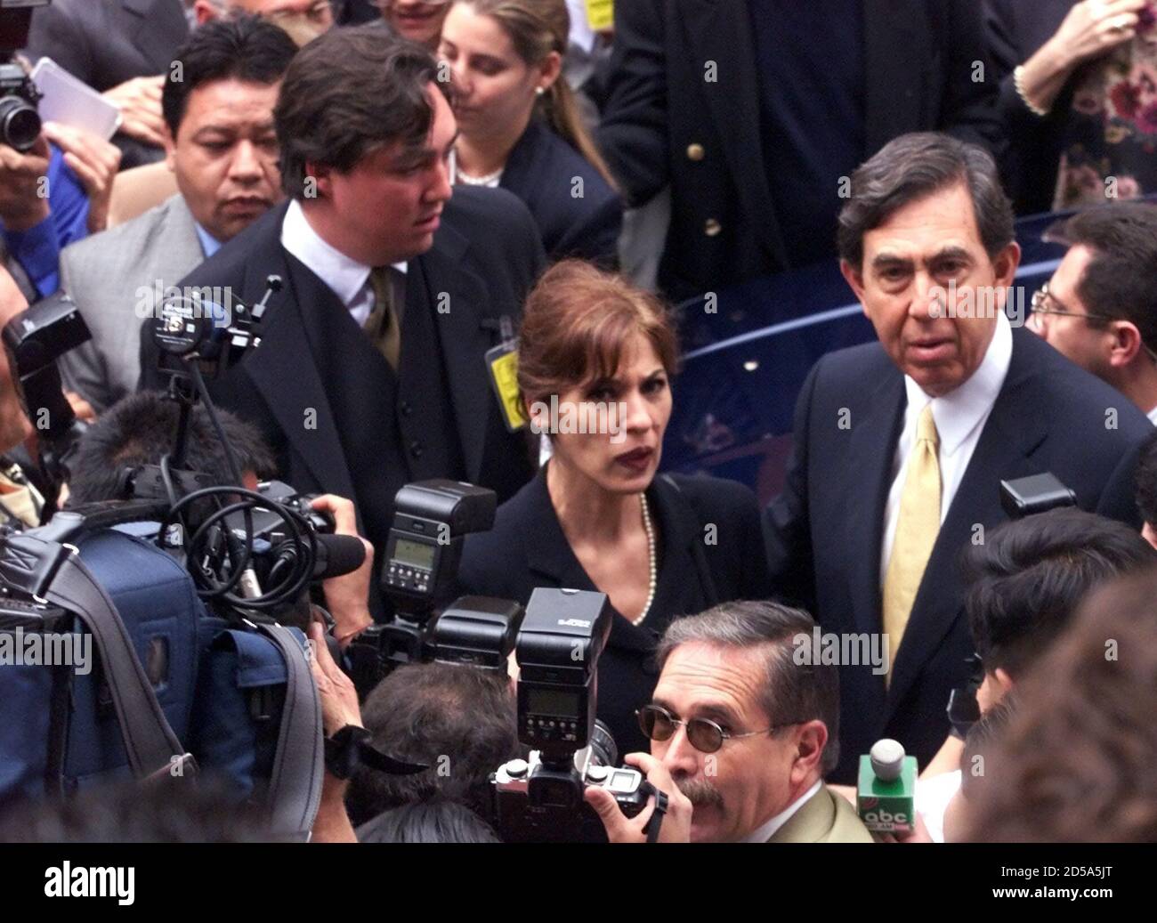 Mexico City Mayor Cuauhtemoc Cardenas (R) along with his wife Celeste Batel  and his son Cuauhtemoc Cardenas Batel (R) arrive at the legislative  assembly September 17 where he will give his second