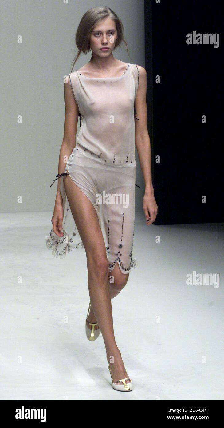A model wears a semi-transparent dress as part of the Prada Spring/Summer  2000 collection September 27. Milan's fashion will end on October 1 with  Versace's collection. SR/ME Stock Photo - Alamy