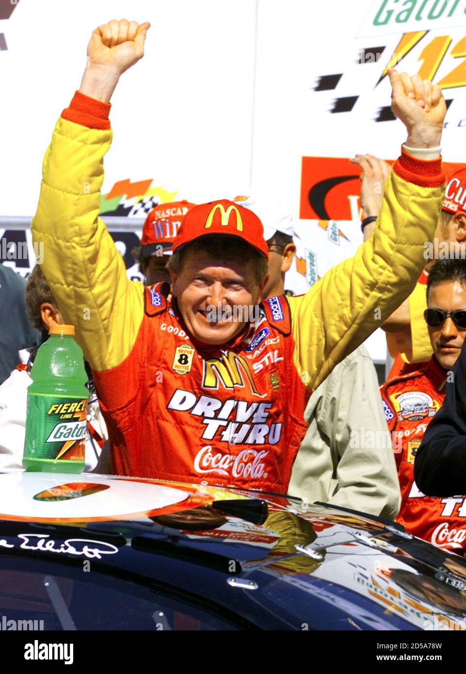 NASCAR driver Bill Elliott celebrates in victory lane after winning the