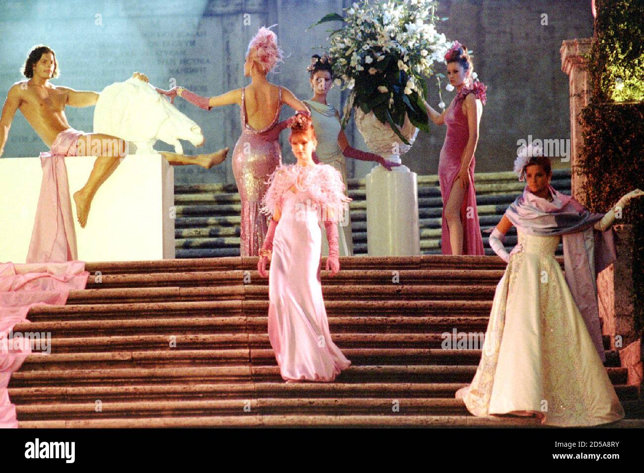 Models wears a design from Valentino in a televised extravaganza staged at the world-famous Spanish Steps Rome July 19 at the end of Italian Moda fashion show Stock Photo -