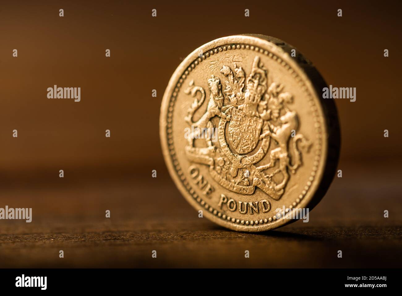 pound GBP coin on the desk Stock Photo