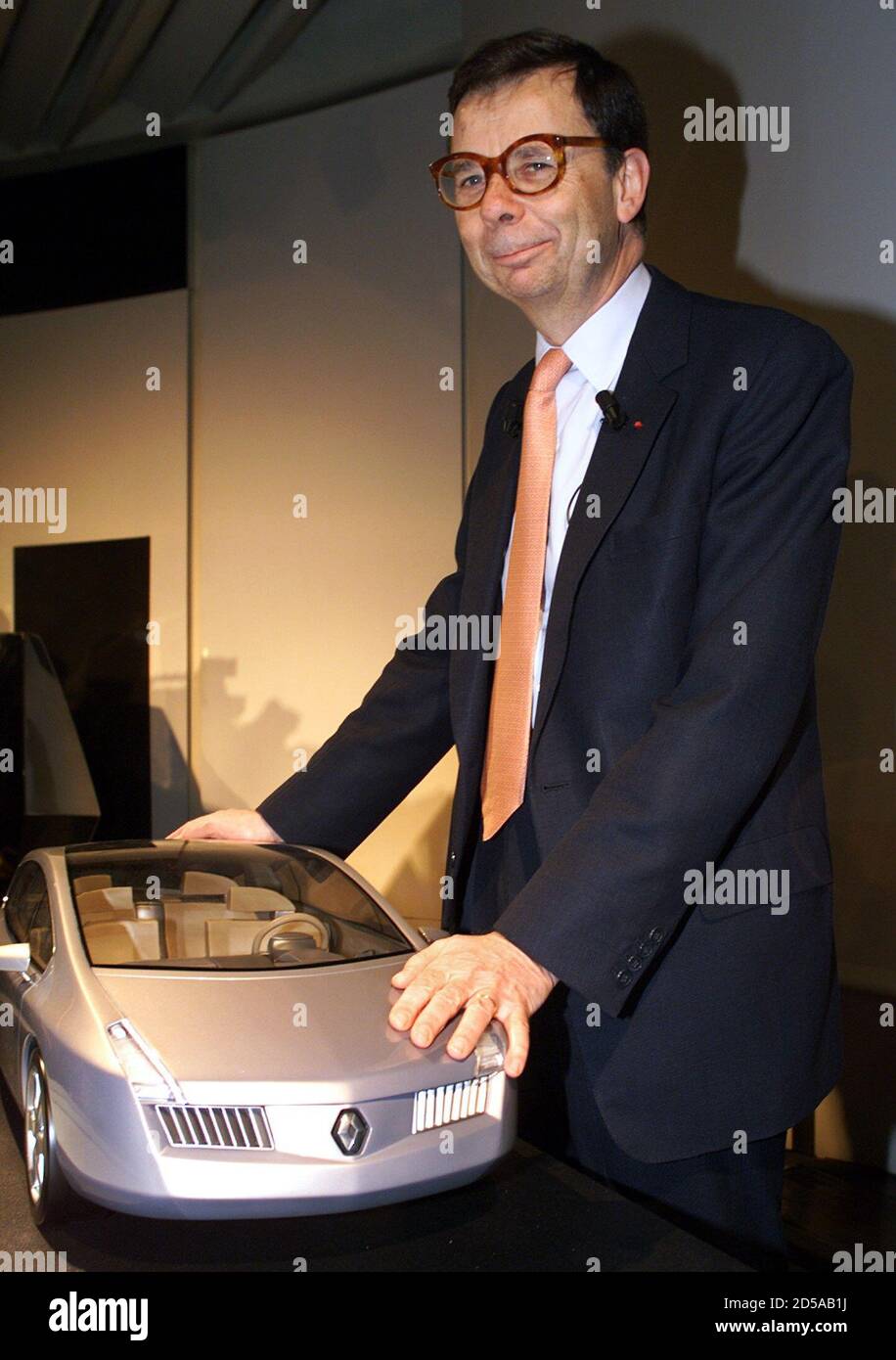 France S Renault Chairman Louis Schweitzer Poses Near A Model Of The Vel Satis At The Start Of A Press Briefing At The Company S Headquarters March 1 Schweitzer Announced Renault S Profit Jumped