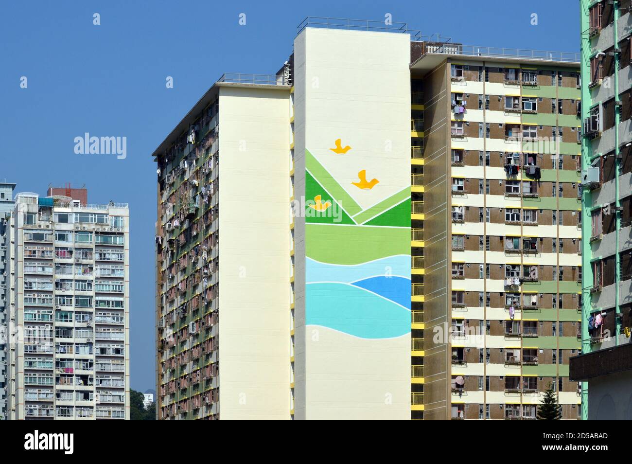 Colourful bird design on repainted Bean Goose House, a public housing