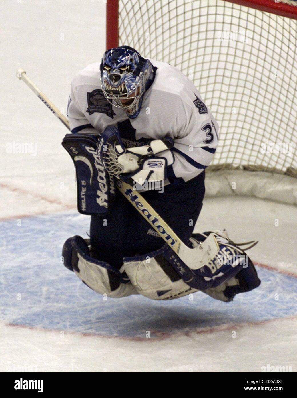 Toronto Maple Leafs Goalie Curtis Joseph Is Off The Ice While Making A Save Against The Pittsburgh Penguins During First Period Nhl Playoff Action May 9 Ac Jp Stock Photo Alamy