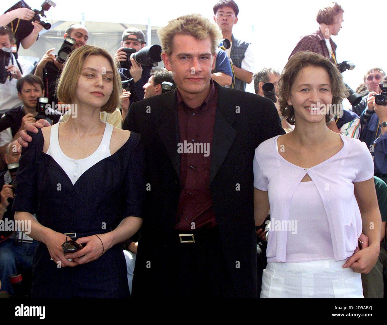 French Actor Guillaume Depardieu C Puts His Arms Around Lithuanian Actress Katerina Golubeva L And French Actress Delphine Chuillot R During A Photo Call For French Director Leos Carax S Film Pola X