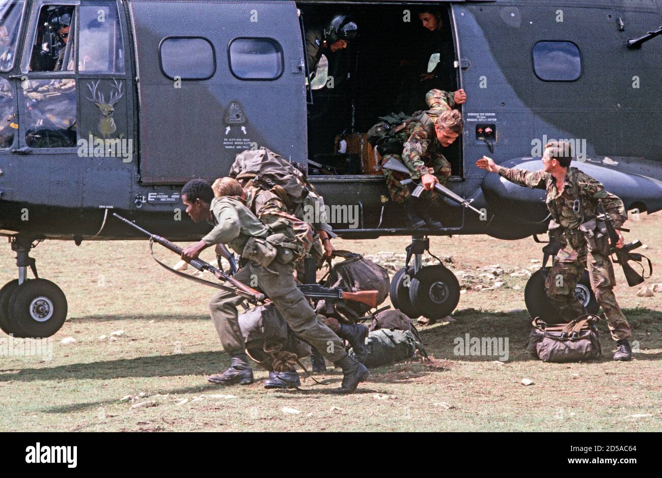 British Army soldiers jumping out of Royal Air Force helicopter, Belize,  Central America, 1980s Stock Photo - Alamy