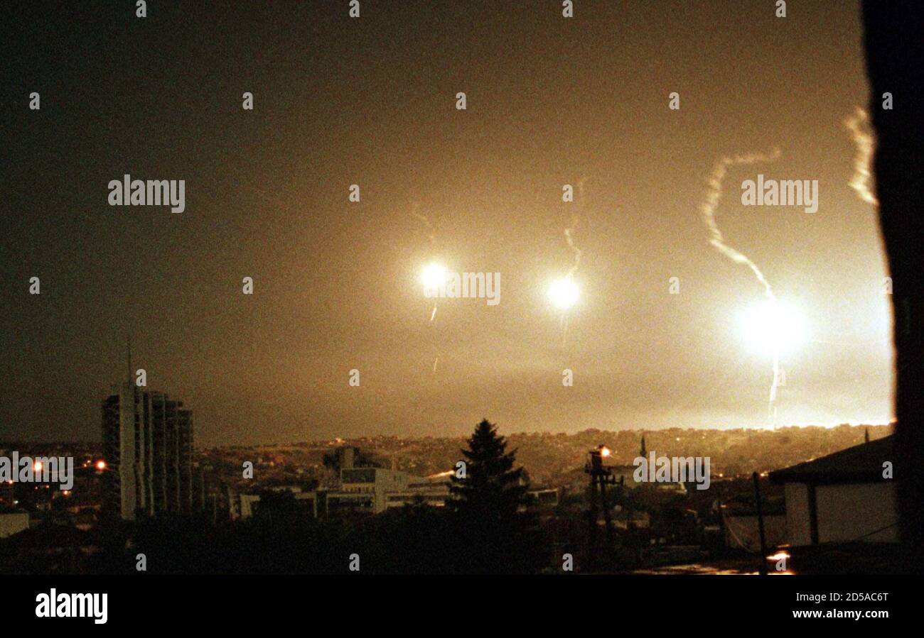 Flares illuminate the sky over Pristina during a NATO air strike early June 2. European Union and Russian envoys on Wednesday were expected to depart on a crucial mission to Belgrade for talks likely to decide whether diplomacy can bring a quick end to NATO's 70-day air war against Yugoslavia. Stock Photo