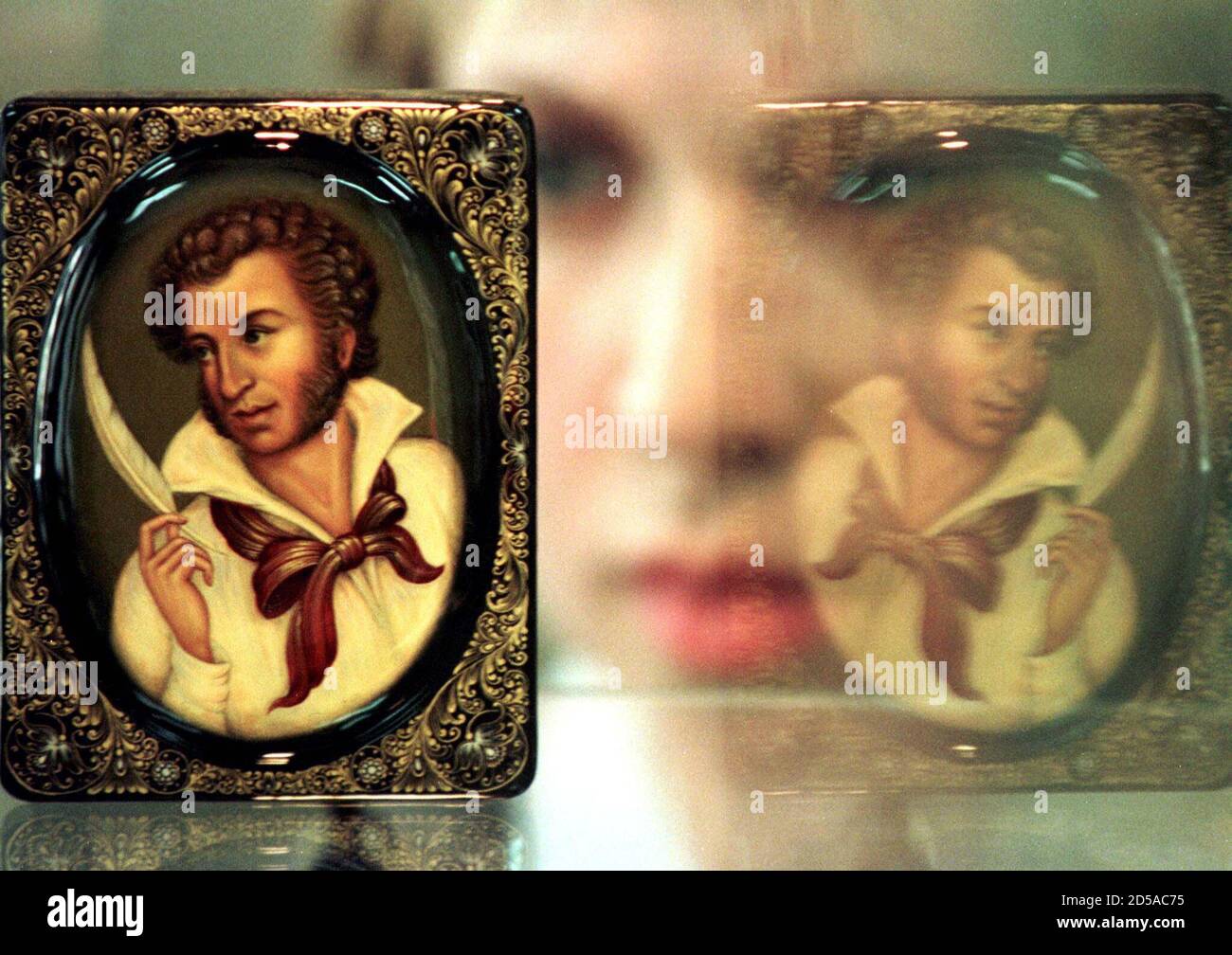 elbow Minimal Limited A visitor looks at a portrait of Russian poet Alexander Pushkin painted on a box in traditional Palekh manner during the exhibition of "Fairy tales of Pushkin in Palekh miniature" June 3. elbow Minimal Limited A visitor looks at a portrait of Russian poet Alexander Pushkin painted on a box in traditional Palekh manner during the exhibition of "Fairy tales of Pushkin in Palekh miniature" June 3.