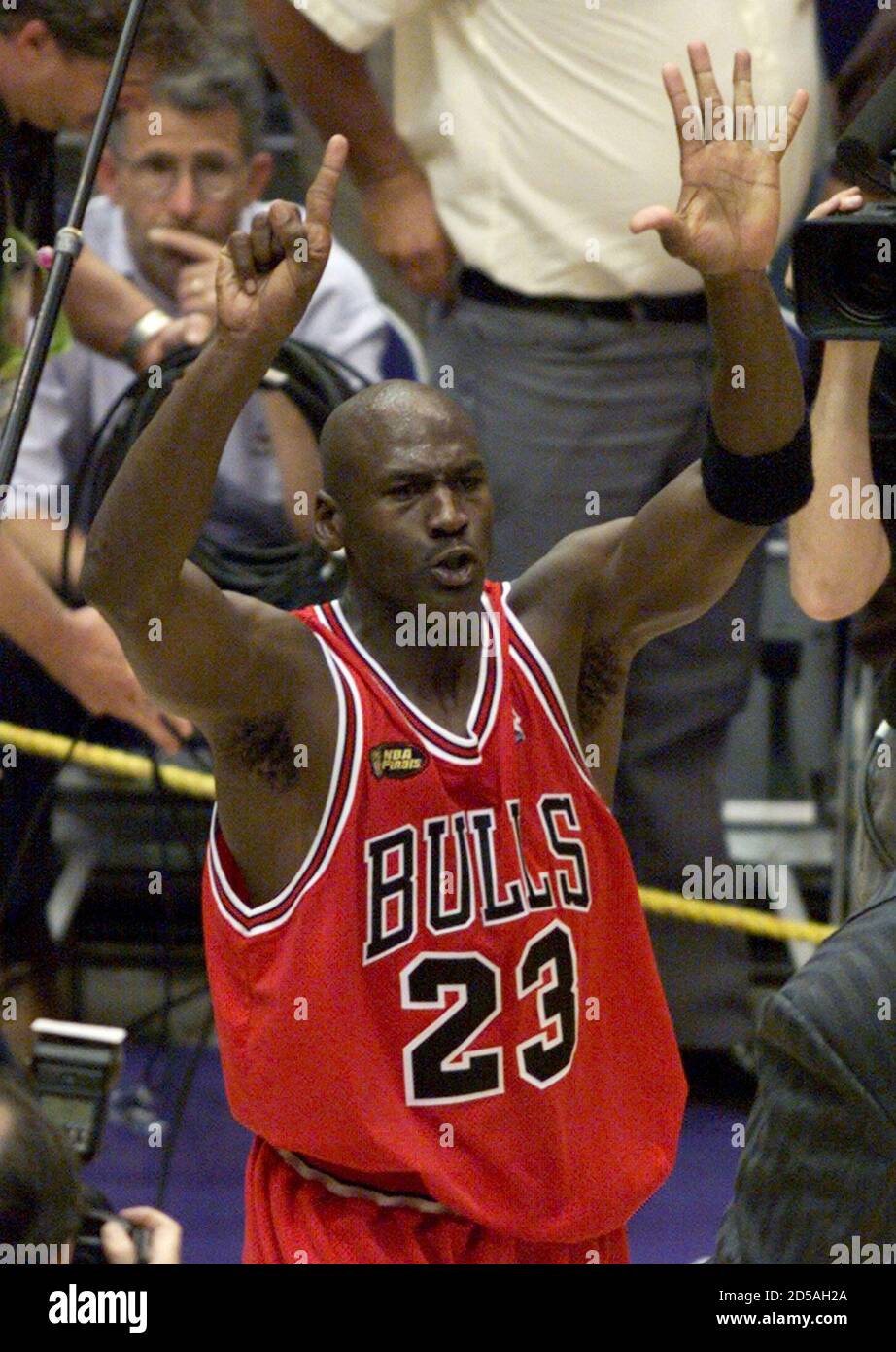 Chicago Bulls Michael Jordan holds up six fingers as he walks around the  court after the Bulls defeated the Utah Jazz 87-86 to win the NBA  championship June 14. Jordan lead the