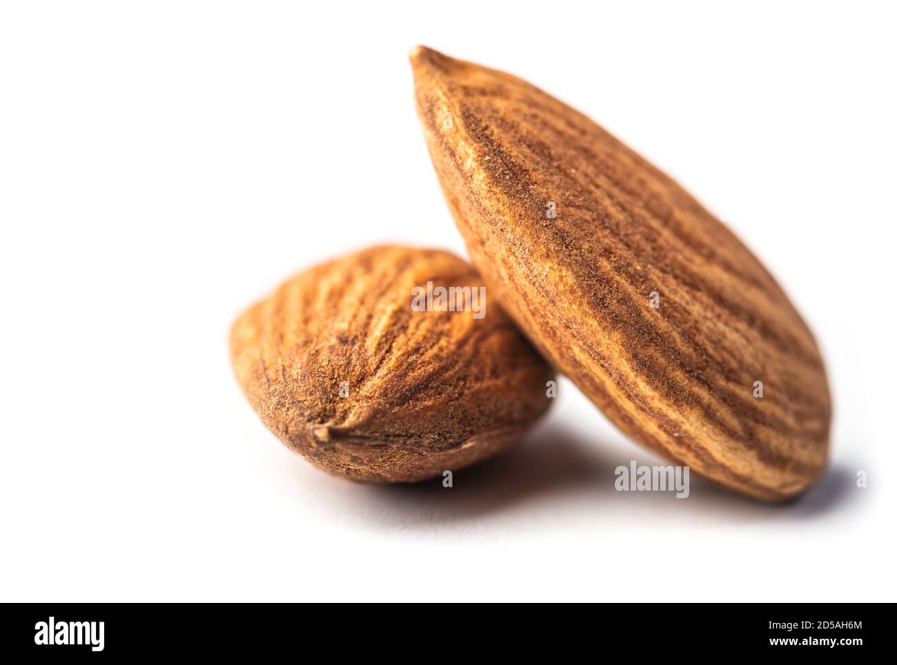 Closeup of almonds, isolated on the white background Stock Photo