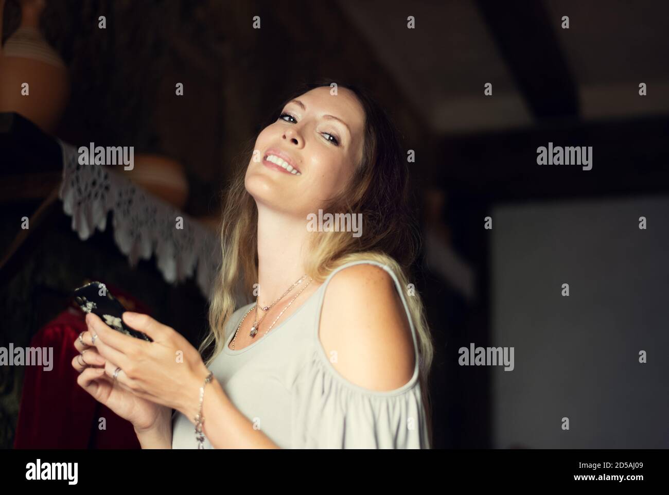 Portrait of young beautiful woman in asian restaurant smile and posing ...