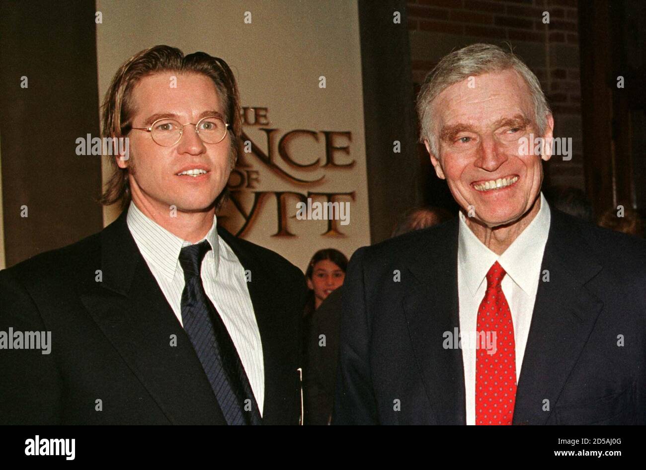 Two actors who have portrayed the biblical character of Moses on film, Val  Kilmer (L) in "The Prince of Egypt", and Charlton Heston, pose at its  premiere December 16 in Los Angeles.