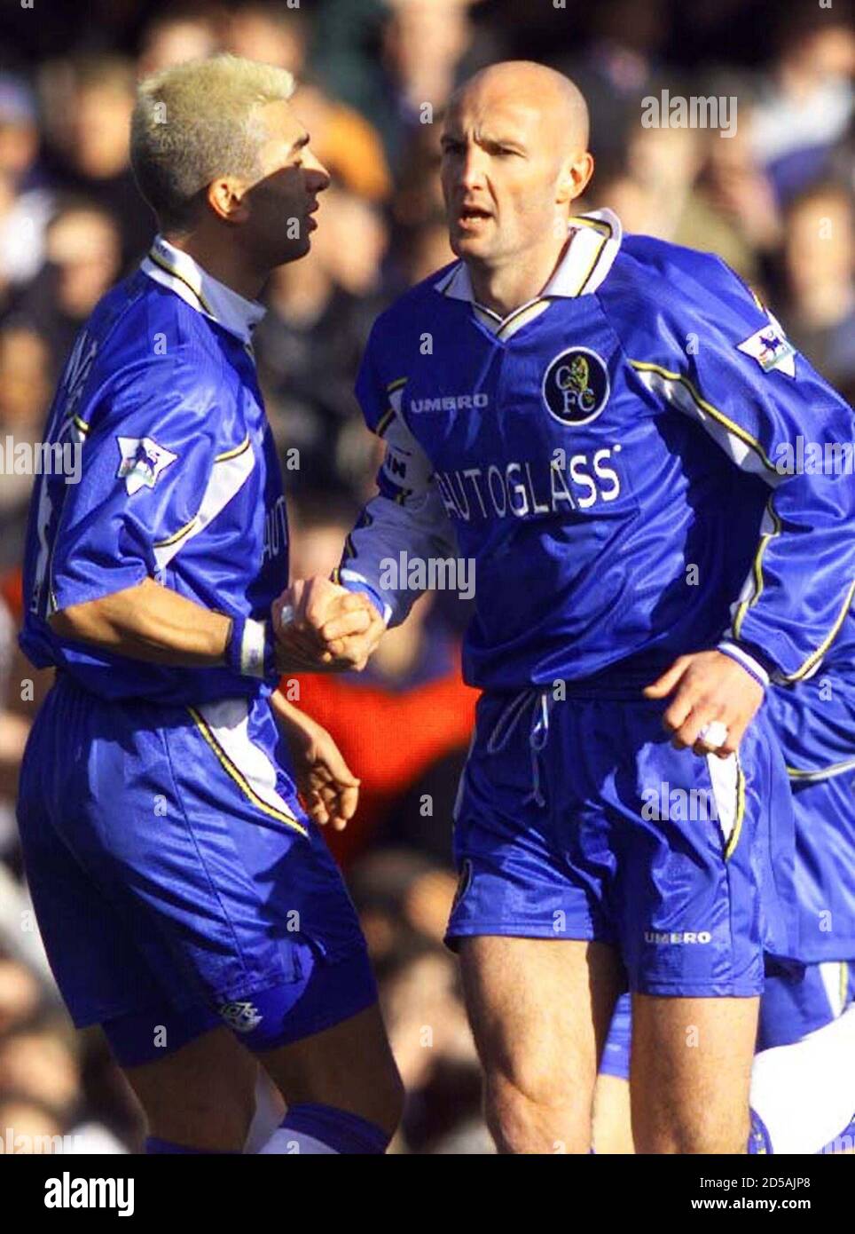 Chelsea's French defender Frank Leboeuf (R) celebrates scoring the opening  goal with Roberto Di Matteo against Liverpool during their premiere league  match February 27. Chelsea have recently had their pitch completely  resurfaced