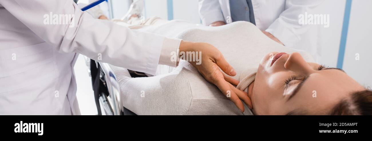 Woman on stretcher hi-res stock photography and images - Alamy