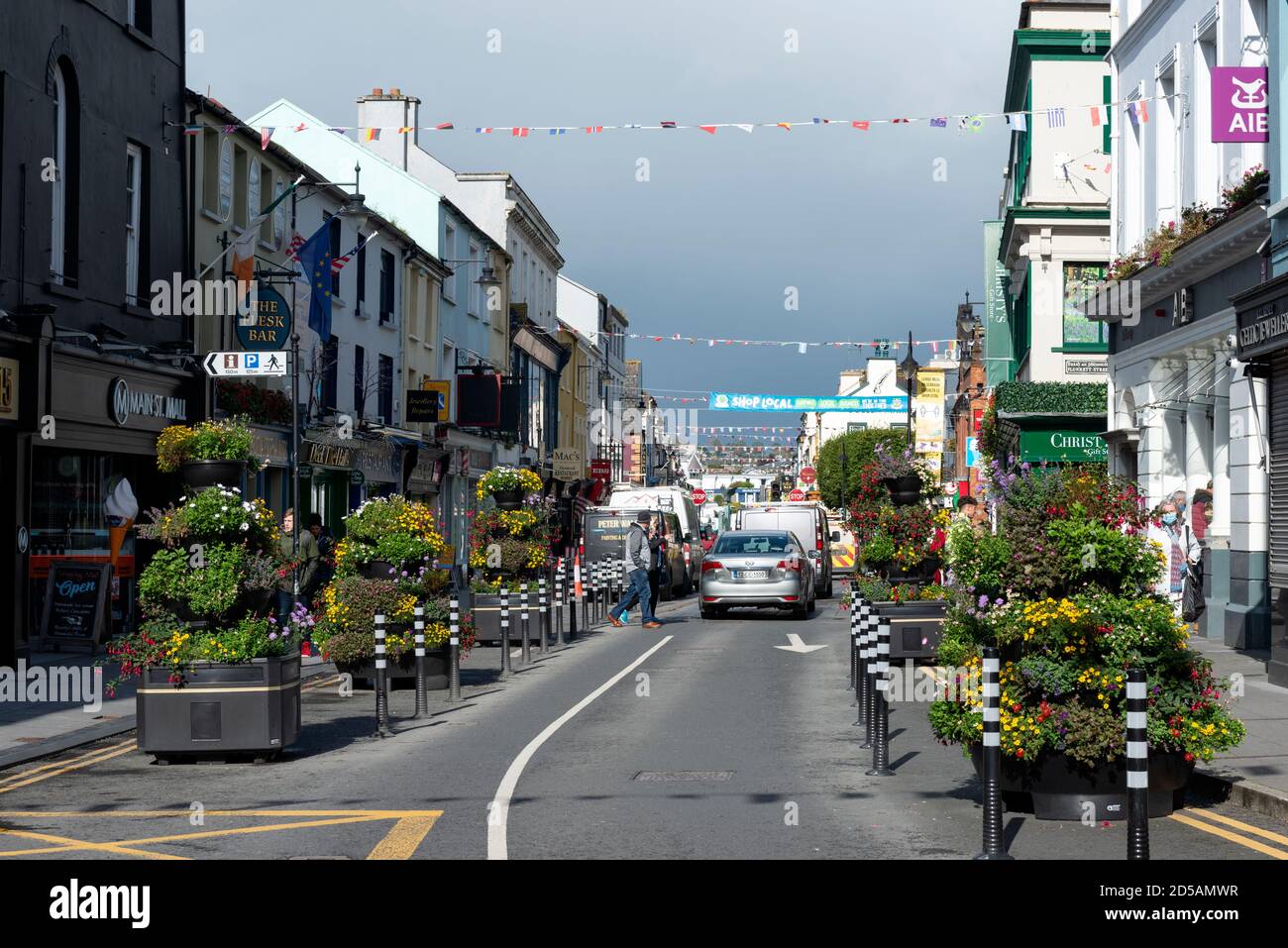 Killarney Main Street redesigned with large flower pots as the town has a new look during in 2020 in Killarney, County Kerry, Ireland Stock Photo