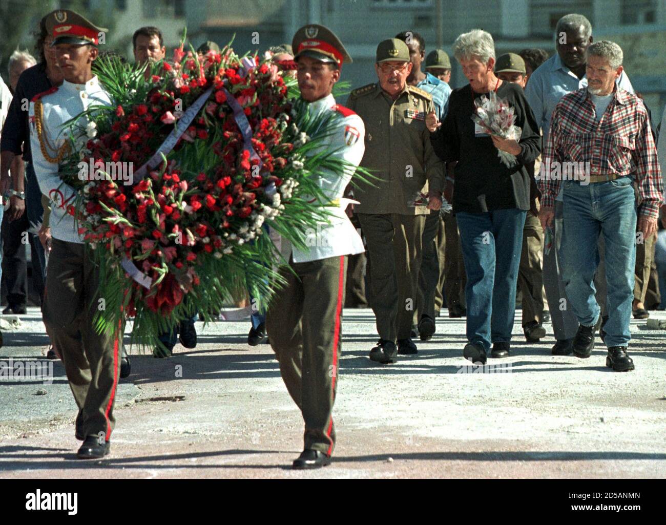 Cuban Soldiers Carry A Floral Tribute To Toss Into The Sea Off Havana  October 28 In Memory Of Guerrilla Hero Camilo Cienfuegos Who Died Exactly  40 Years Ago When His Plane Disappeared