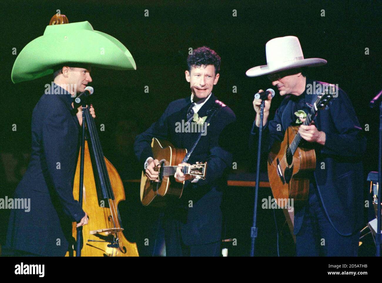 Musicians Sting (L) Lyle Lovett and James Taylor (R) perform at the
