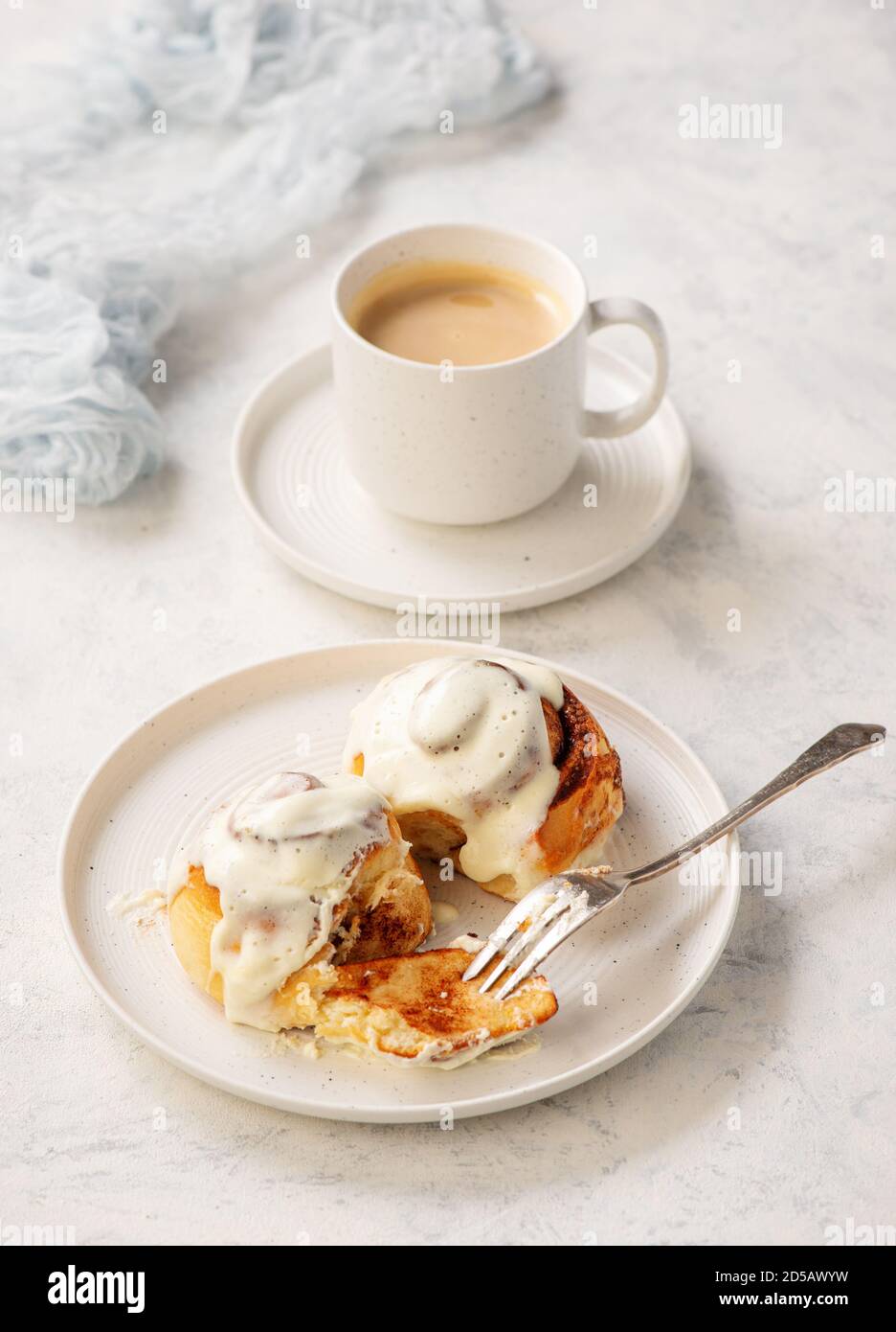 Homemade cinnamon buns with cream cheese icing Stock Photo Alamy