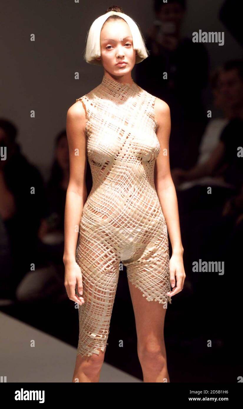 A model poses in a skin tight woven 