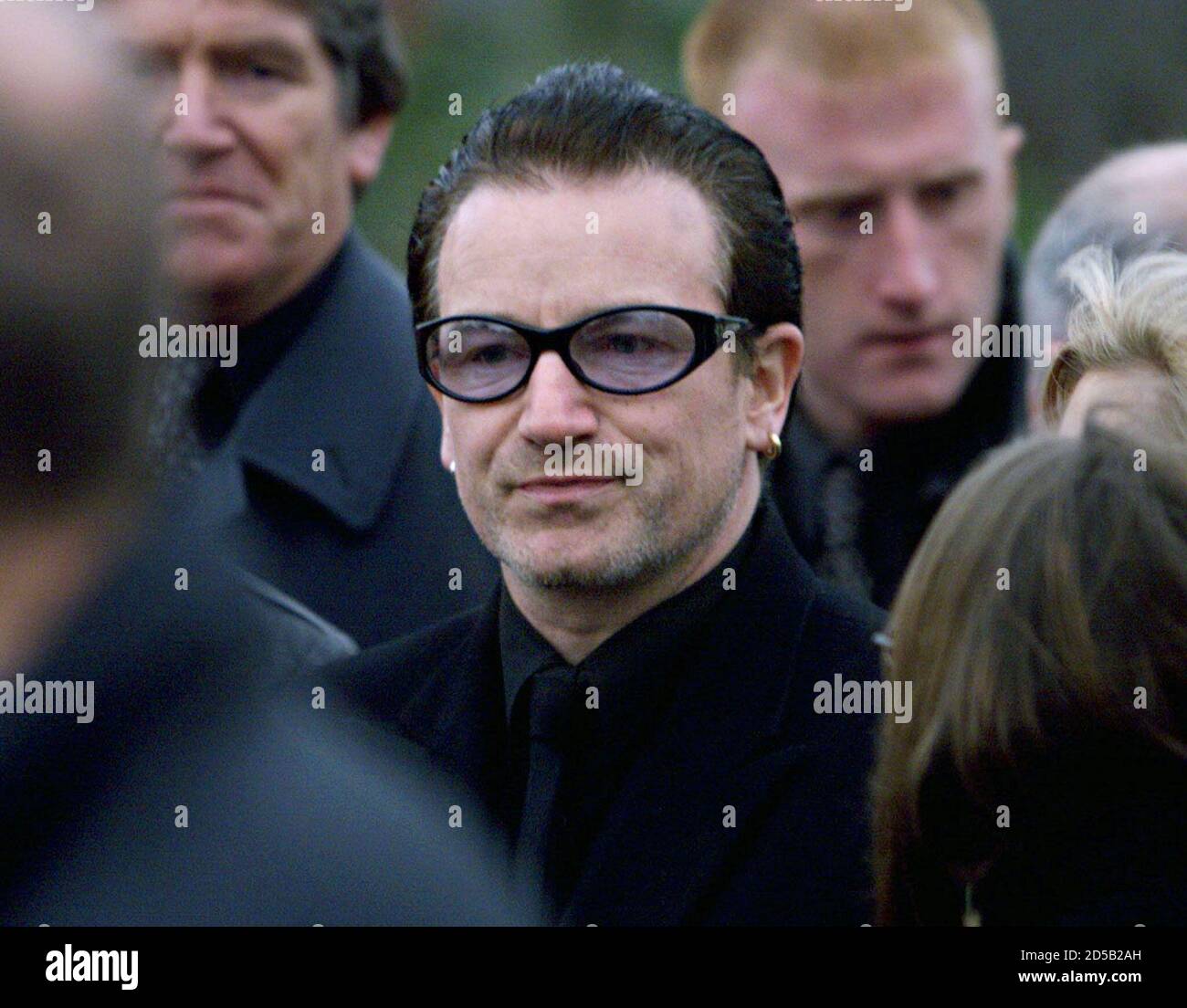 U2 lead singer Bono walks behind Jean Corr's coffin in Dundalk on Novemver  27. Jean Corr, aged 57, mother of the members of Irish pop band 'The Corrs'  died last Wednesday and