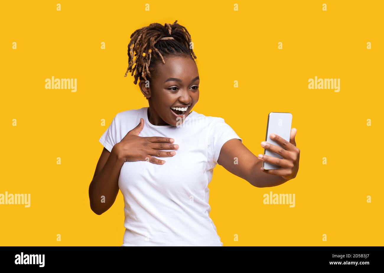 Excited black woman hi-res stock photography and images - Alamy