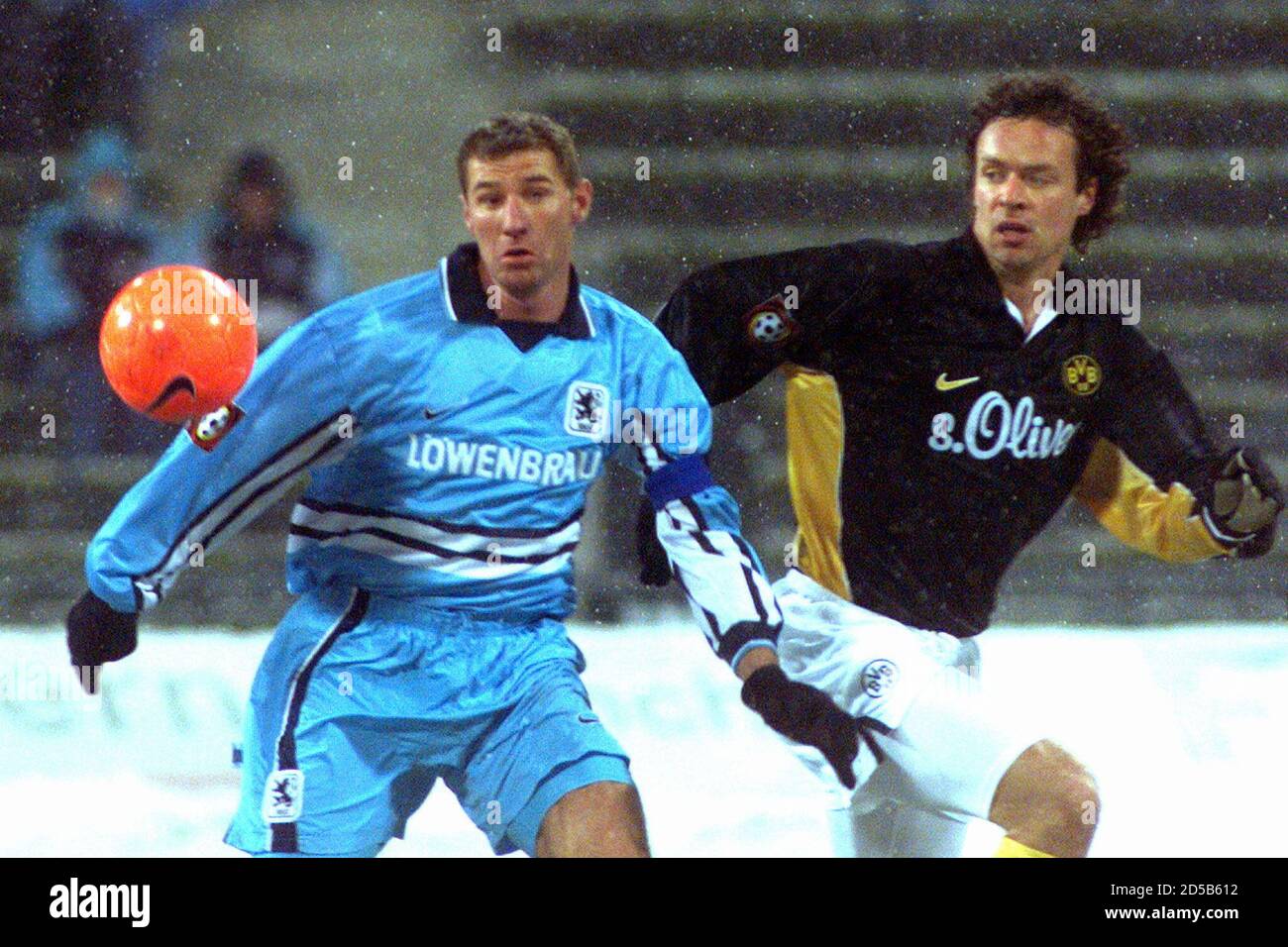 Bernhard Winkler Of Tsv 1860 Munich And Alfred Niijhuis Of Borussia Dortmund Fight For The Ball During German First Division Soccer Match In Munich Bernhard Winkler L Of Tsv 1860 Munich And