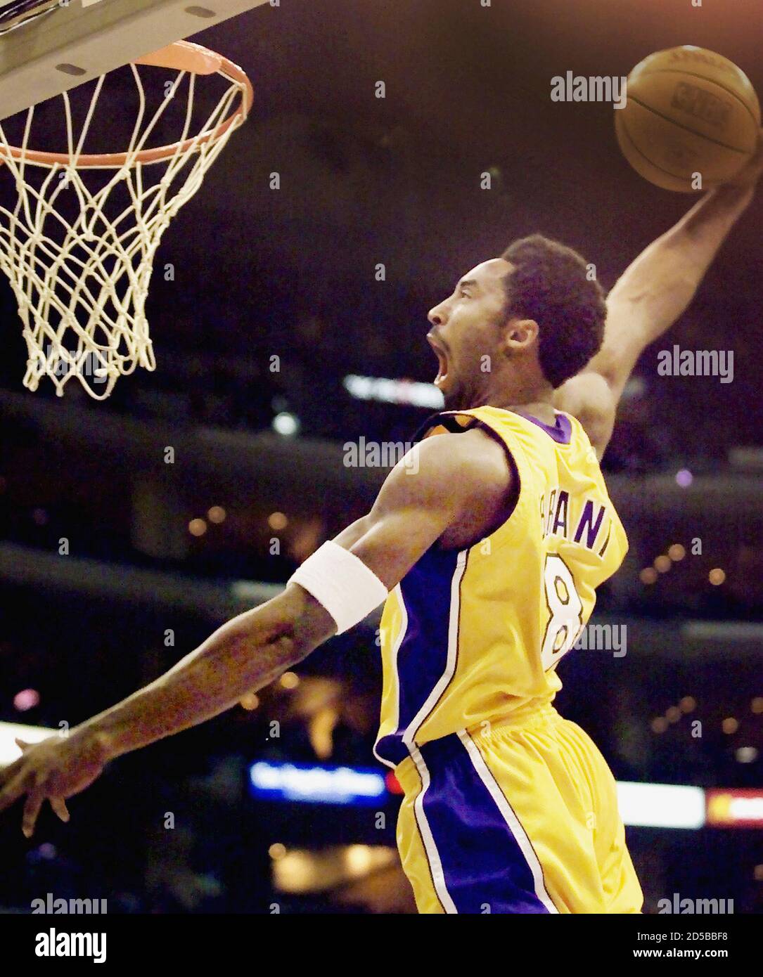 The Los Angeles Lakers Kobe Bryant flies in for the slam dunk against the  Houston Rockets in the first quarter during their NBA matchup February 27  at the Staples Center in Los