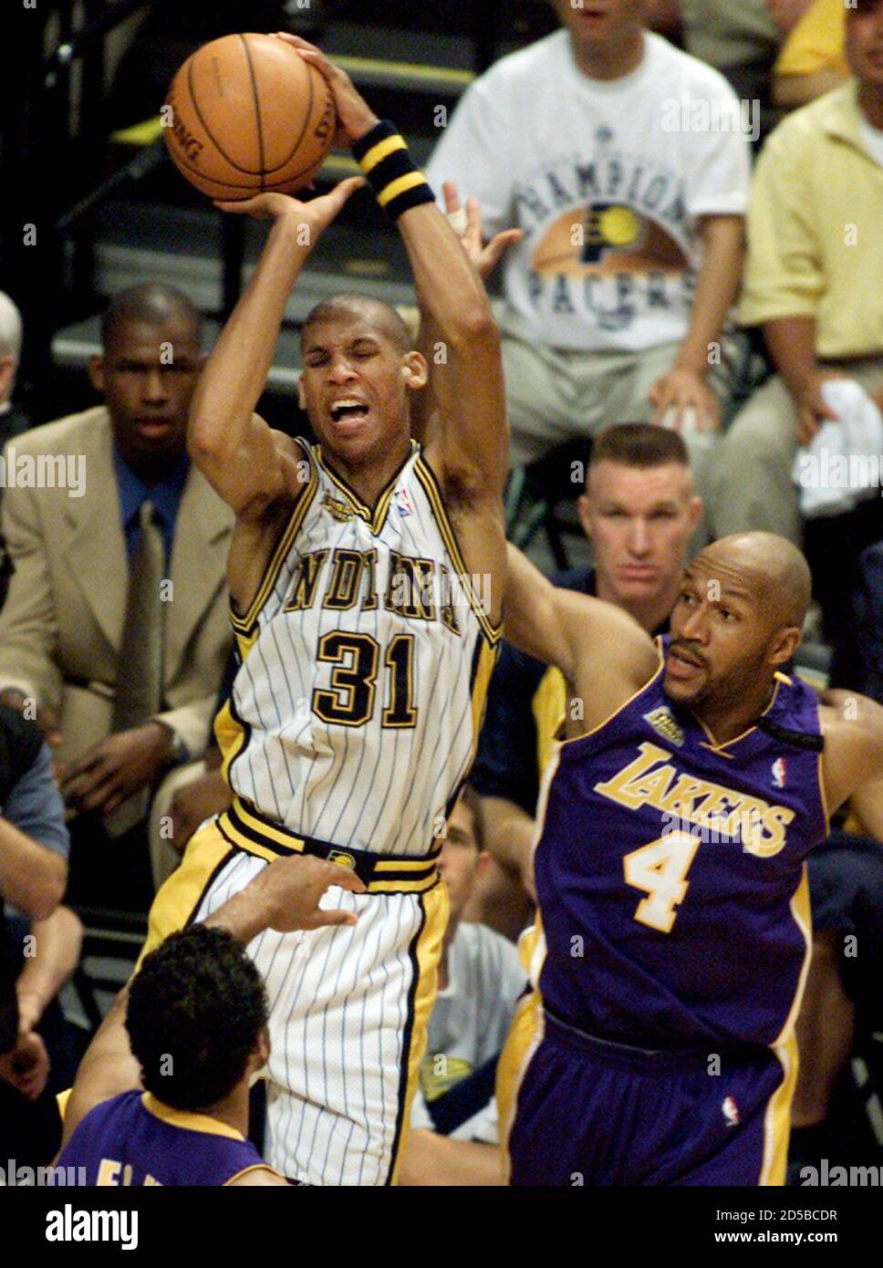 Indiana Pacers Reggie Miller L Shoots As He Is Guarded By Los Angeles Lakers Travis Best During Game 4 Of The Nba Finals In Indianapolis June 14 The Lakers Have A 2 1