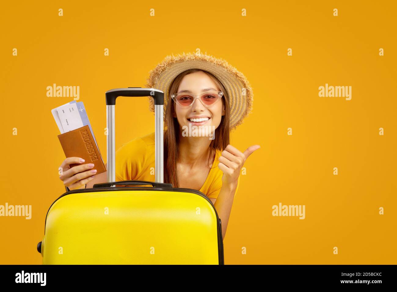 Happy tourist woman thumb hi-res stock photography and images - Alamy