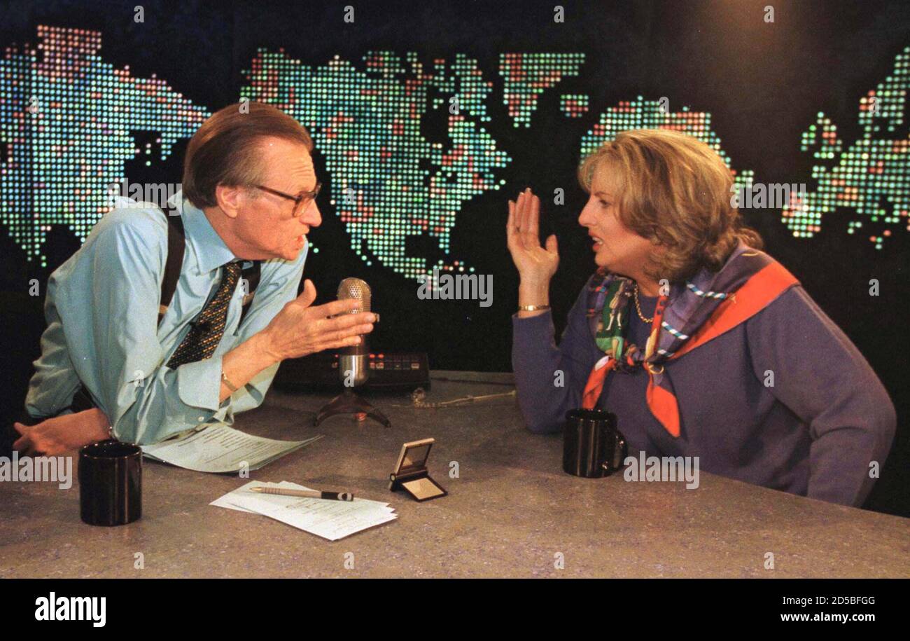 Larry King (L), the host of CNN's 'Larry King Live,' interviews Linda Tripp February 15. Tripp, who turned over tapes of her conversations with former White House intern Monica Lewinsky to independent counsel Kenneth Starr, said she is 'seriously considering' writing a book.  ELD/WS Stock Photo