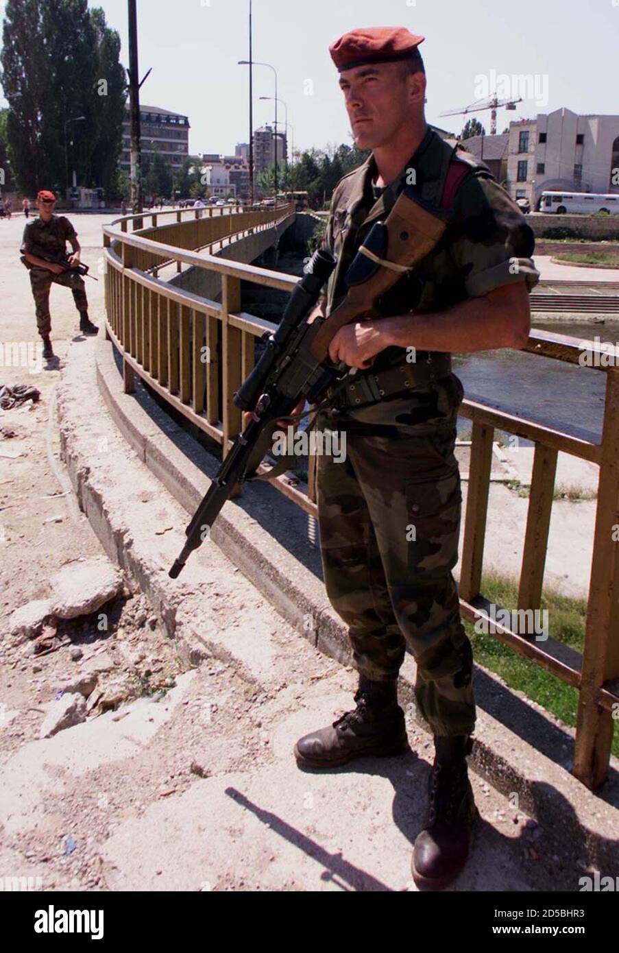 A French Paratrooper Guards The Bridge At Ibar River In Kosovska Mitrovica July 22 Although More Than Half Of Kosovo S Serbs Have Left In Mitrovica Many Have Stayed And Split The Town