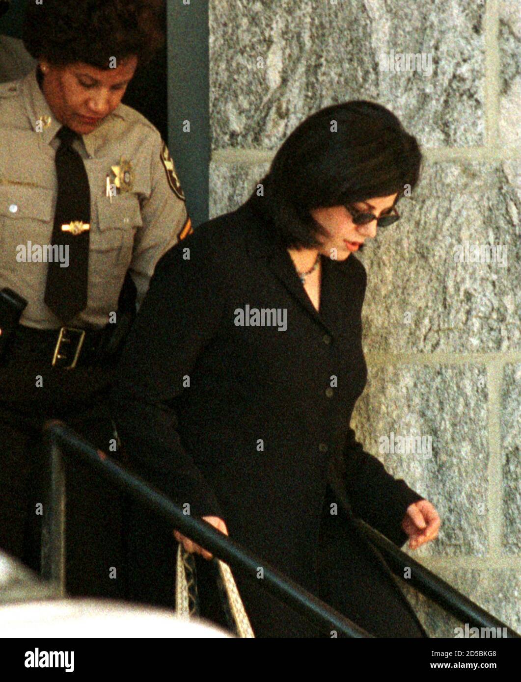 Former White House intern Monica Lewinsky leaves the Howard County Courthouse, December 16. [Lewinsky testified on Thursday she never gave Linda Tripp permission to tape-record their telephone conversations about her relationship with President Bill Clinton. In testimony at a pretrial hearing to determine whether Tripp can be tried for alleged violations of Maryland's wiretap law, Lewinsky also said she remembered the date of a conversation that Tripp is charged with recording based on her own recollection -- a crucial point in the prosecutors' case for bringing Tripp to trial. ] Stock Photo