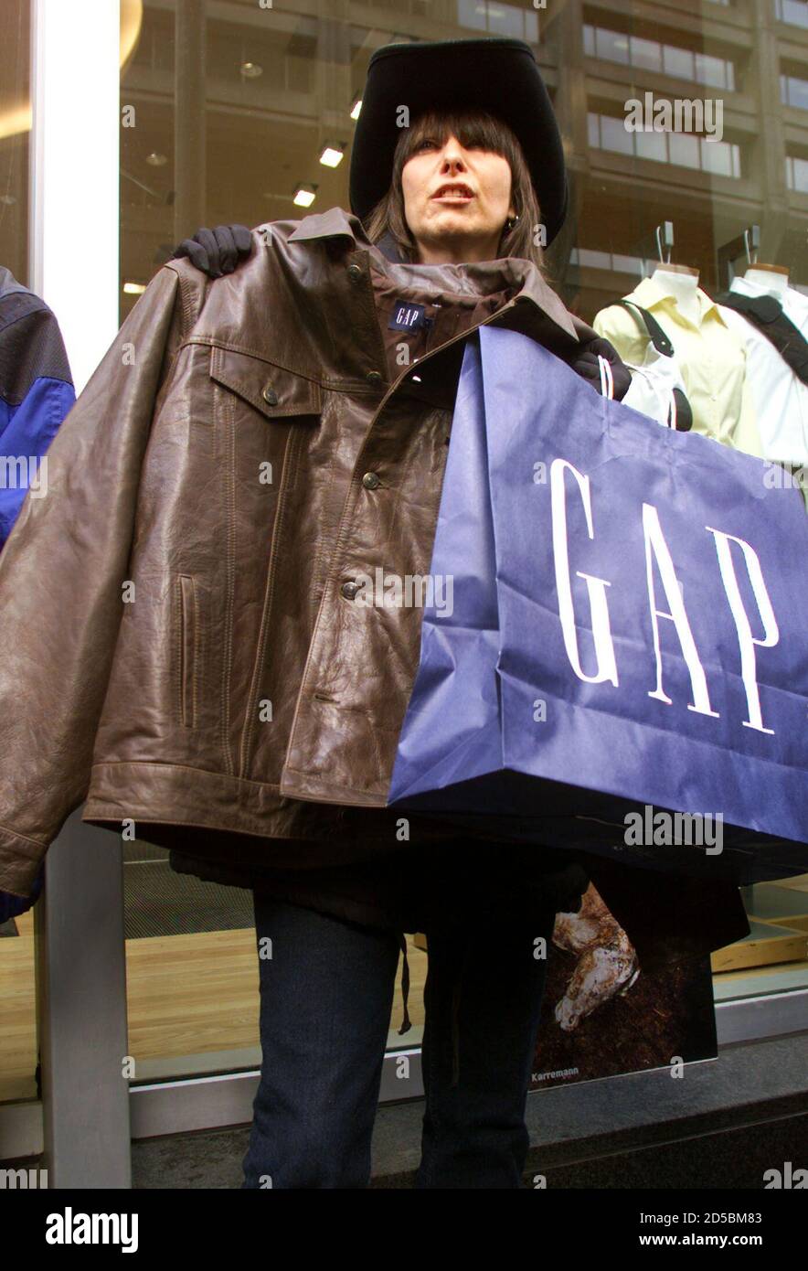 Rock musician Chrissie Hynde holds up a leather jacket she purchased in a GAP store in Toronto, March 2. Hynde bought the jacket while taking part in a protest by PETA (People Rock musician Chrissie Hynde holds up a leather jacket she purchased in a GAP store in Toronto, March 2. Hynde bought the jacket while taking part in a protest by PETA (People
