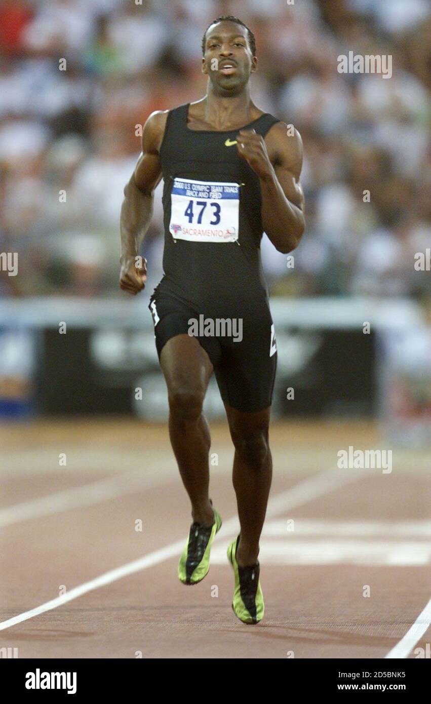 Sprinter Michael Johnson runs to the finish line in his heat in the men's  400m competition at the U.S. Olympic Trials July 14. Johnson, the world  record holder in the event won