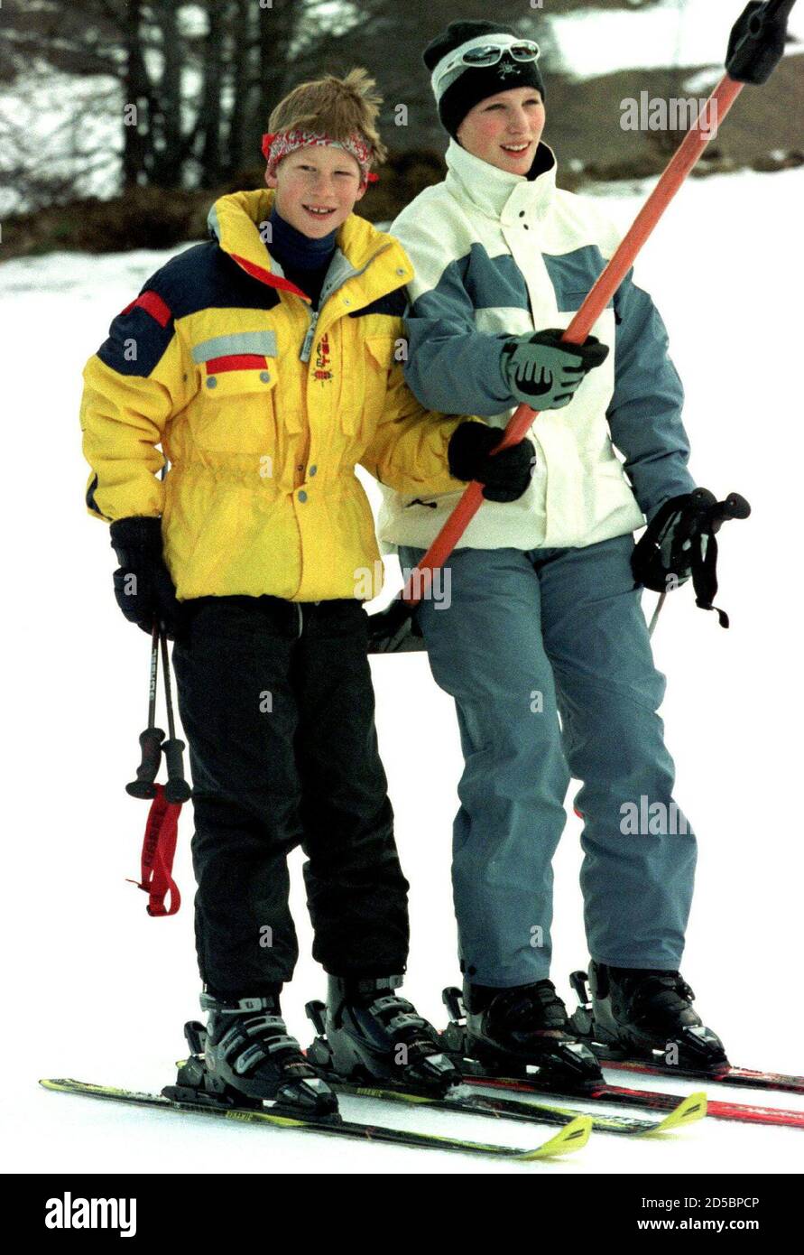 Britain's Prince Harry and his cousin Zara Phillips (R), daughter of the  Princess Royal sit on a t-bar lift in Swiss ski resort Klosters, January 2.  [Klosters remains the Prince Charles' favourite