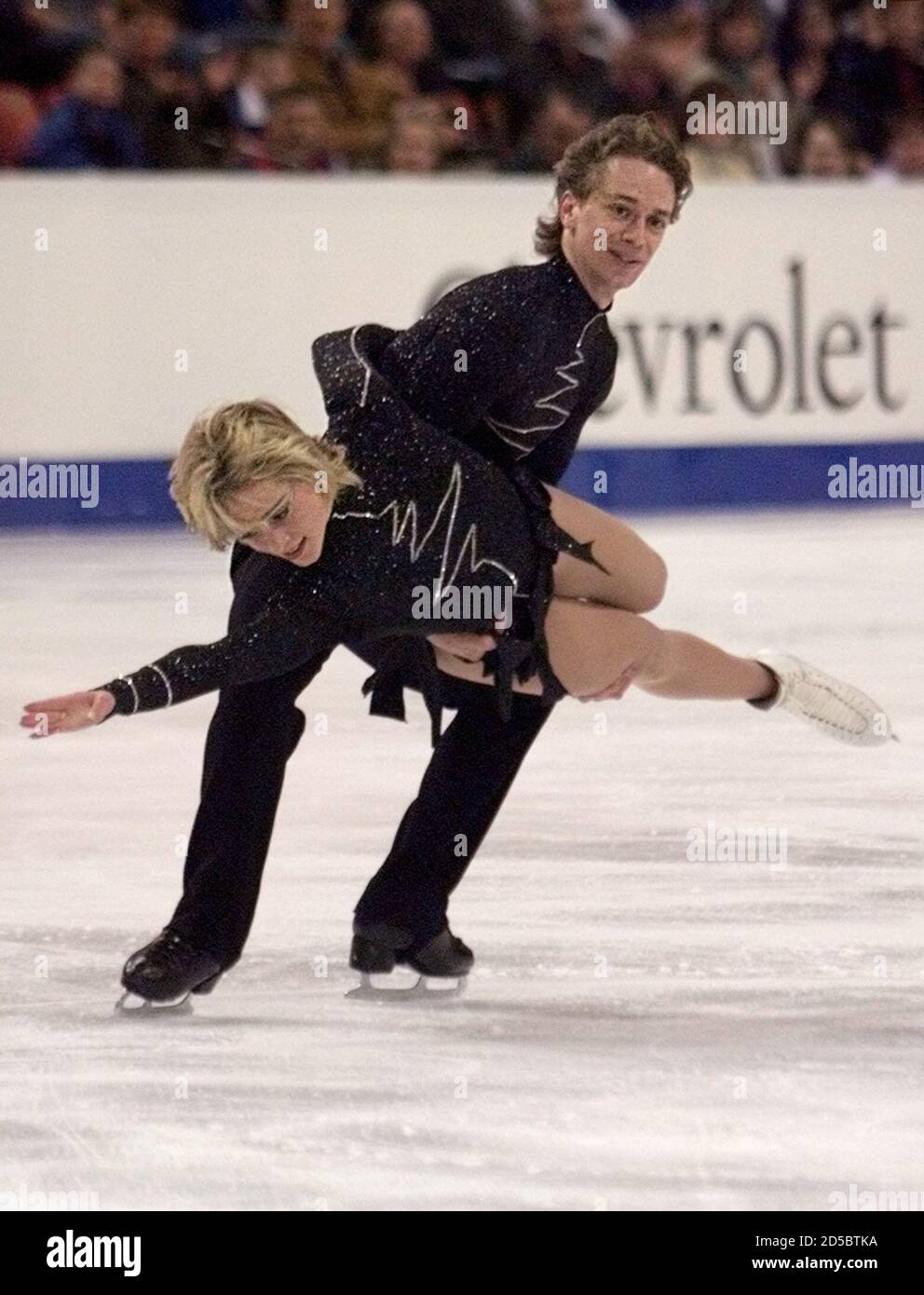 Canadians ShaeLynn Bourne (L) and Victor Kraatz skate their free dance