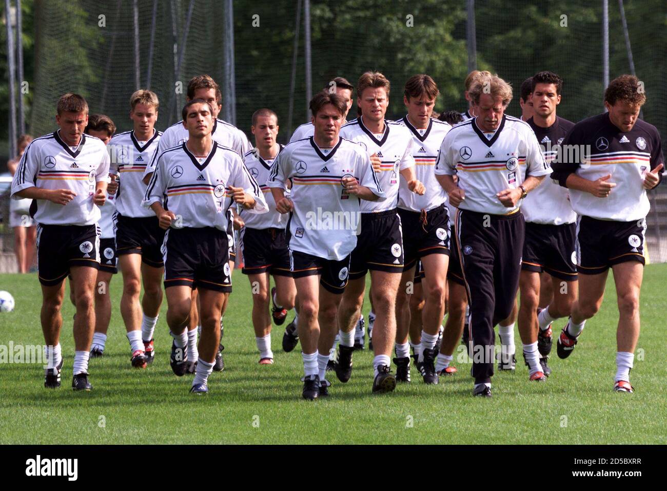German Team Captain Lothar Matthaeus C And Assistant Coach Erich Rutemoeller 3r Lead The Players Of The German National Soccer For Warm Up During A Practice Session For The Fifa Confederations Cup German Team Captain Lothar Matthaeus C And Assistant Coach Erich Rutemoeller 3r Lead The Players Of The German National Soccer For Warm Up During A Practice Session For The Fifa Confederations Cup