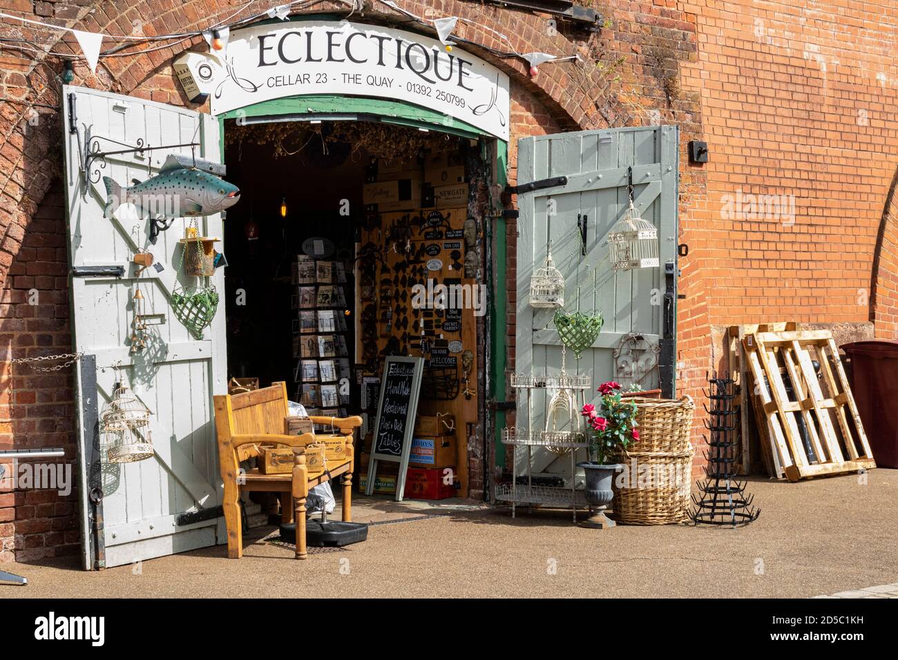 Detail of Open Doors and Entrance to an Artisan Gift Shop at The Historic Cellars on a Sunny Autumn Afternoon, Exeter Quay, Exeter, Devon. Stock Photo