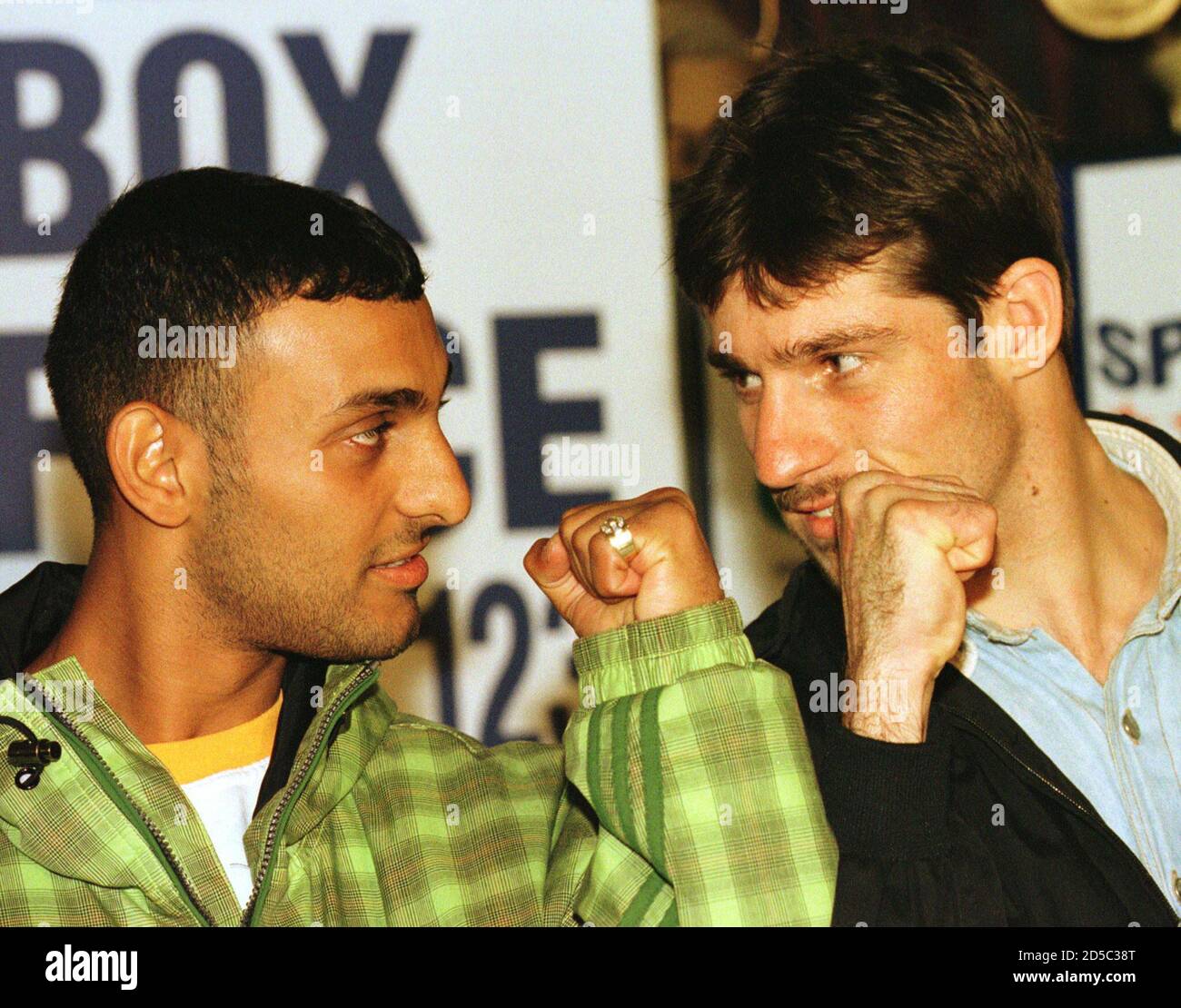 Prince Naseem Hamed (L) squares up to his next opponent, Argentinian Juan  Cabrera at a pre fight news conference, July 17. Hamed, the current World  Boxing Organisation featherweight champion, predicted that he